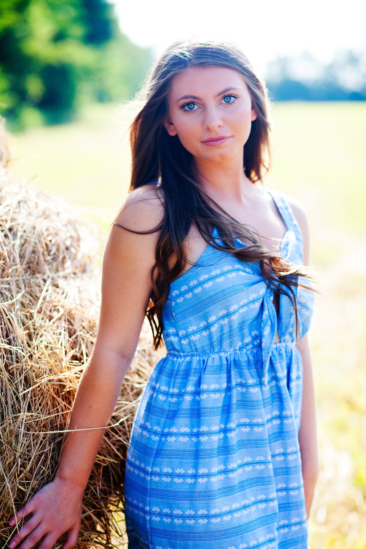 louisville senior girl at blackacre farm with haystack