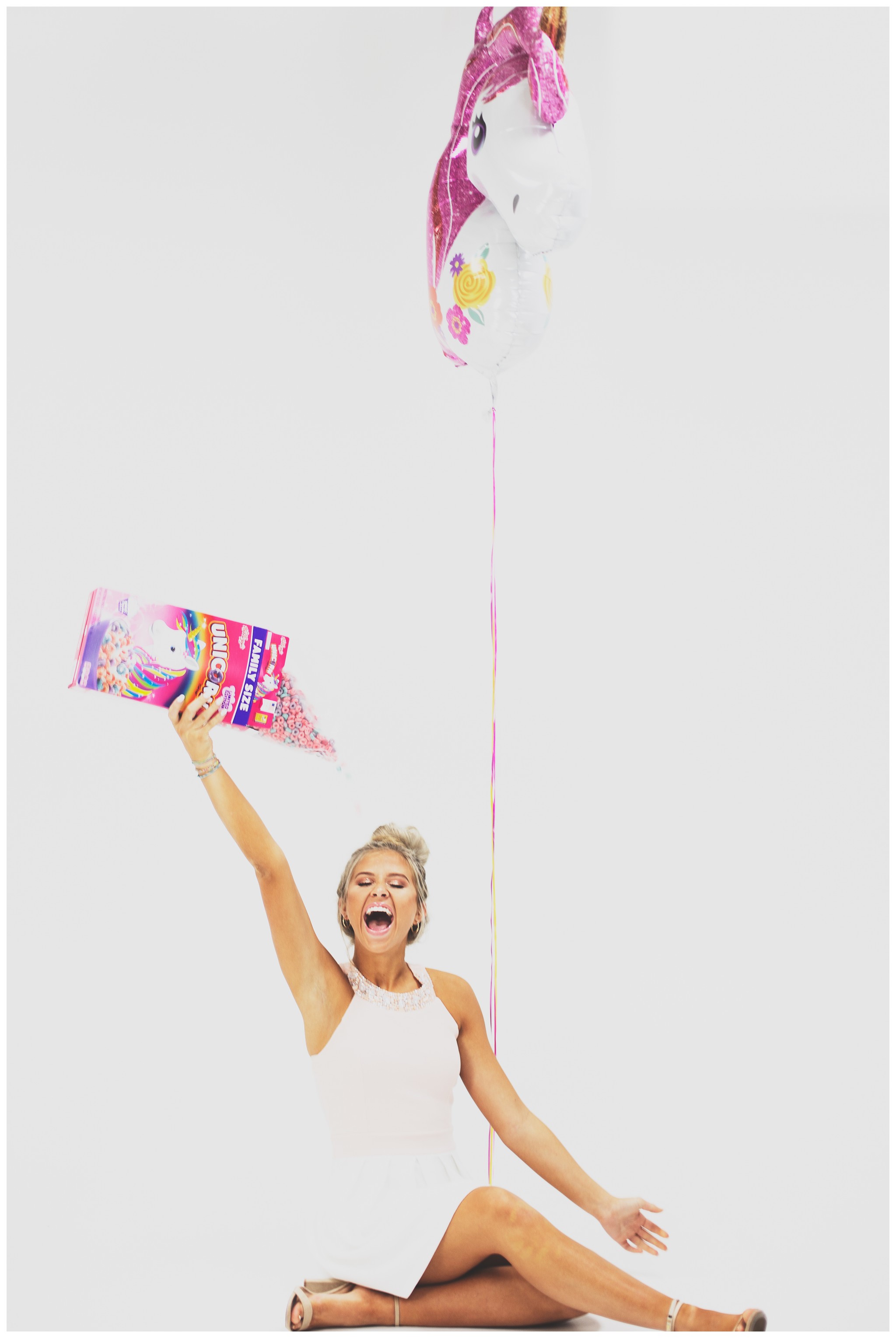Senior Model with Unicorn Balloon and Fruity Pebbles Cereal