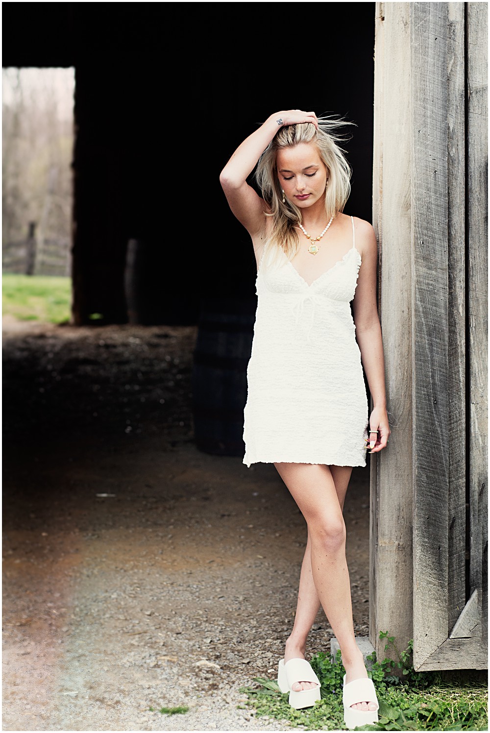 High School Senior Picture of Girl at Louisville Blackacre Farm.jpg